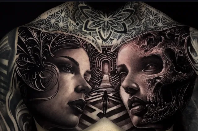 Chest and collarbone black and grey tattoo of a geometric dotwork mandala with two portraits and a perspective corridor