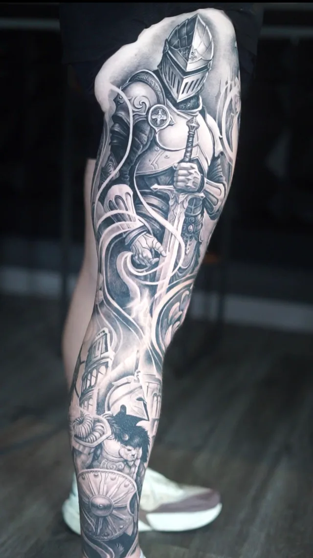 Full leg black and grey realism tattoo sleeve of armored knights in front of ancient Roman architecture
