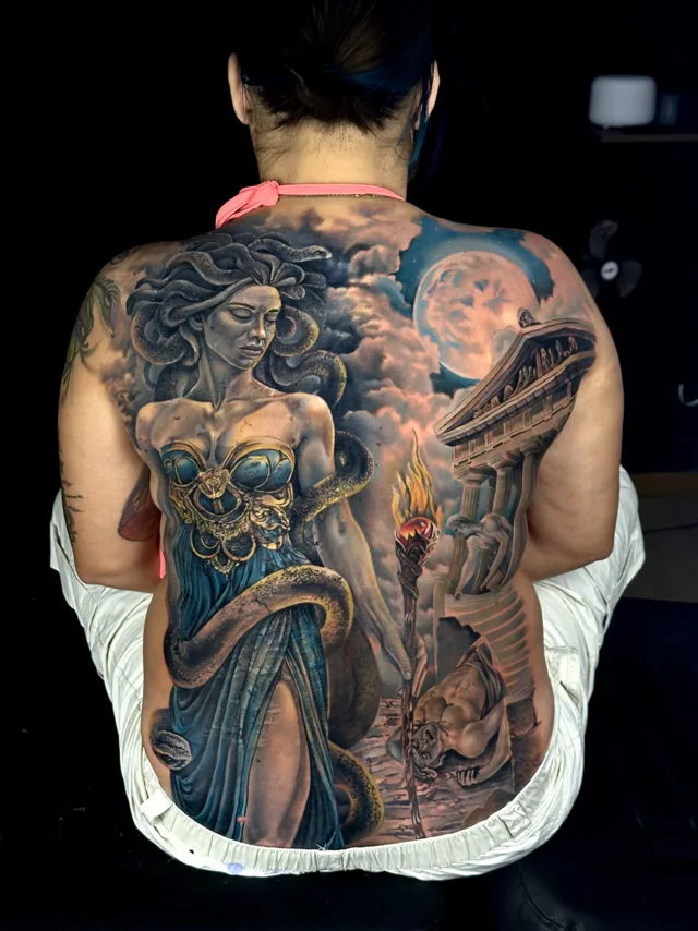 Full back color realism tattoo of Medusa with a torch, moon and classical Greek temple ruins