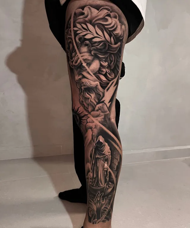 Full leg black and grey tattoo sleeve of a Zeus statue with a grim reaper in a rowboat